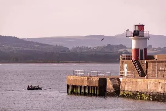 The lighthouse pier at Wicklow harbour on a calm day